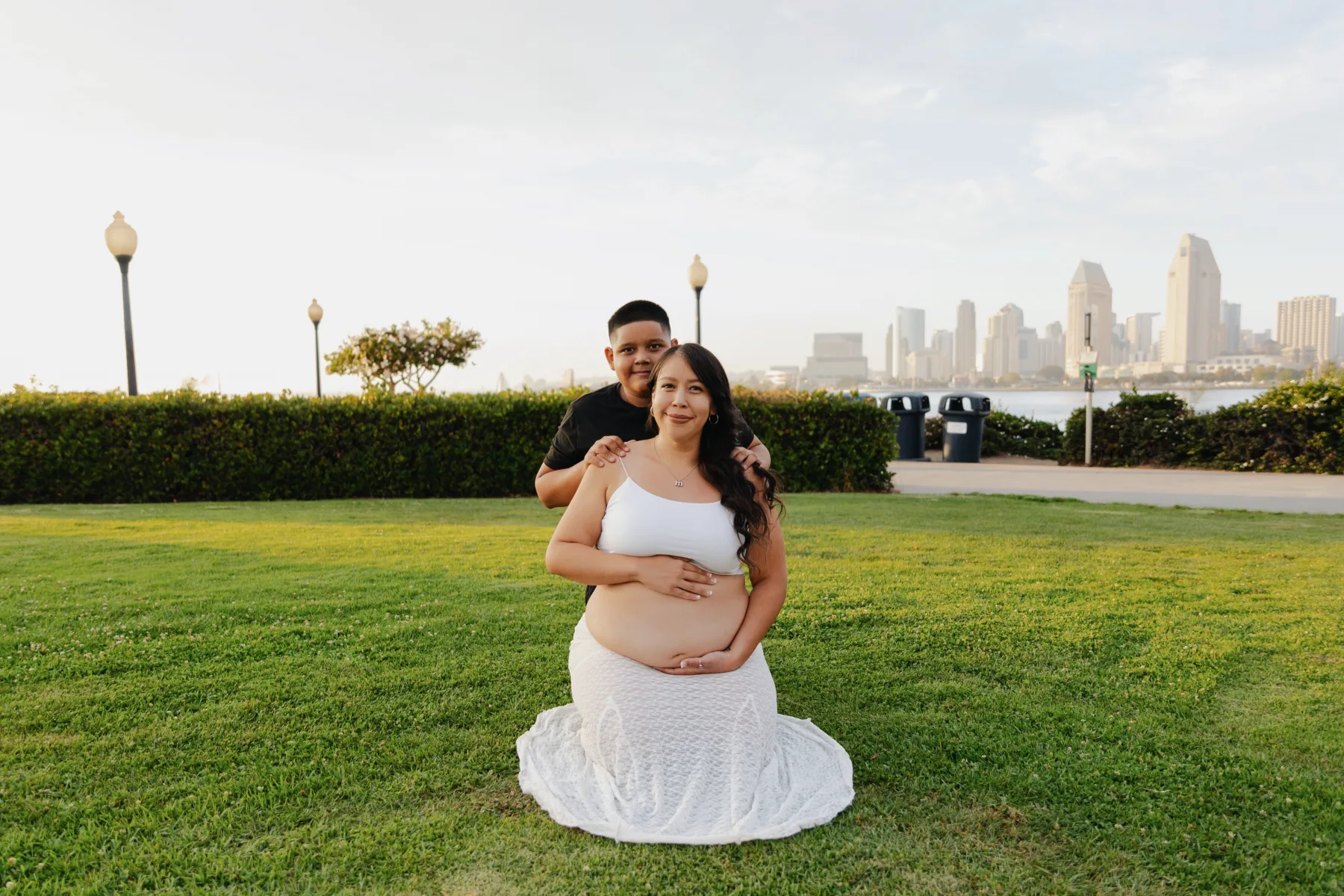 Mom and son maternity portrait with the San Diego skyline