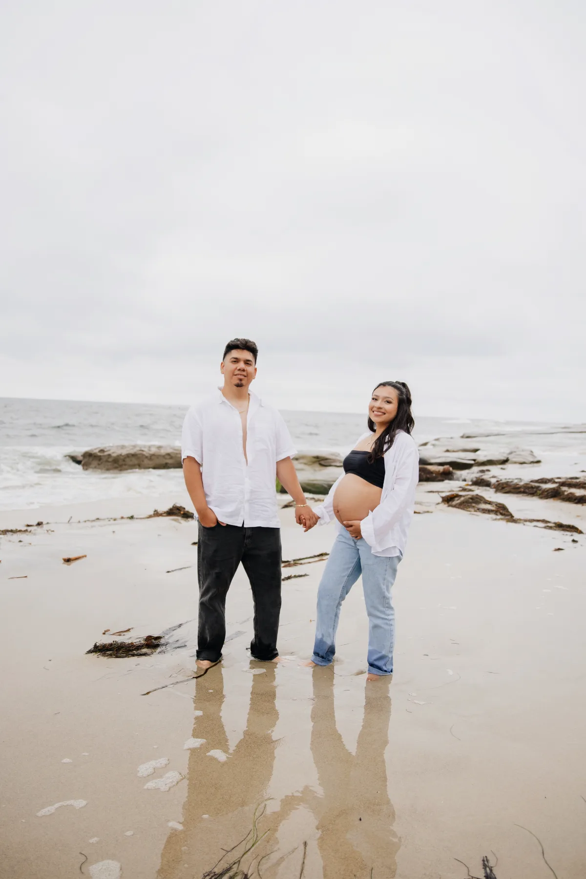 Couple maternity portrait on a La Jolla beach